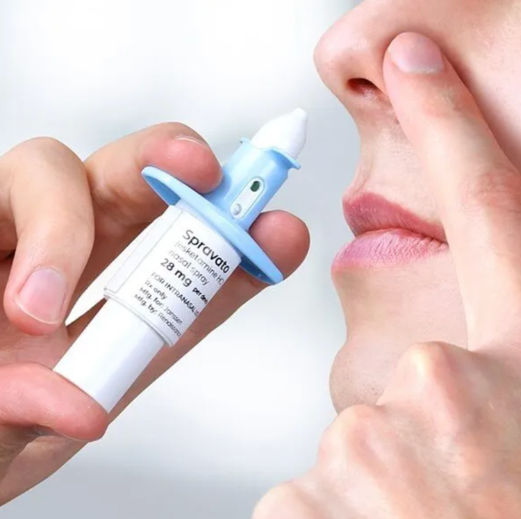 Person administering Spravato® esketamine nasal spray